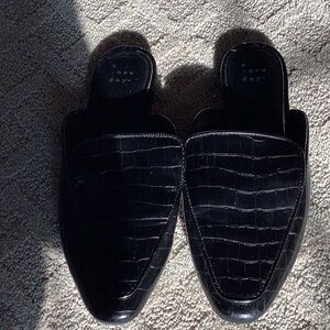 A new day black mule flat